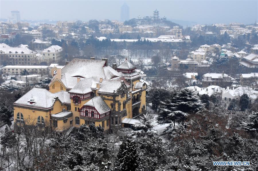 Snowfall seen in Qingdao(1/5)