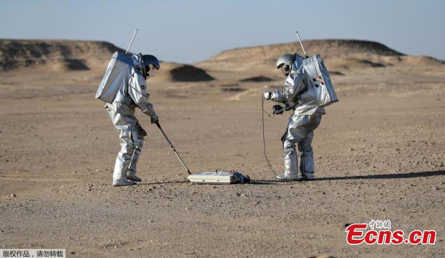 Astronauts are spending a month in isolation on a simulated \'red planet\' in the desolate Dhofar desert in Oman to help prepare humanity for a future mission to Mars. Using a drone, robotic rovers and an inflatable greenhouse, the astronauts will carry out 19 experiments on this baron area, picked for its resemblance to Mars. Seen from space, the Dhofar Desert is a flat, brown expanse and few animals or plants survive its temperatures that can top 125 degrees Fahrenheit, or 51 degrees Celsius.
On the eastern edge of a seemingly endless dune is the Oman Mars Base is a giant 2.4-ton inflated habitat surrounded by shipping containers turned into labs and crew quarters. More than 200 scientists from 25 nations have chosen it as their location to field-test technology for a manned mission to the red planet which Nasa hopes to achieve by the 2030s. (Photo/Agencies)