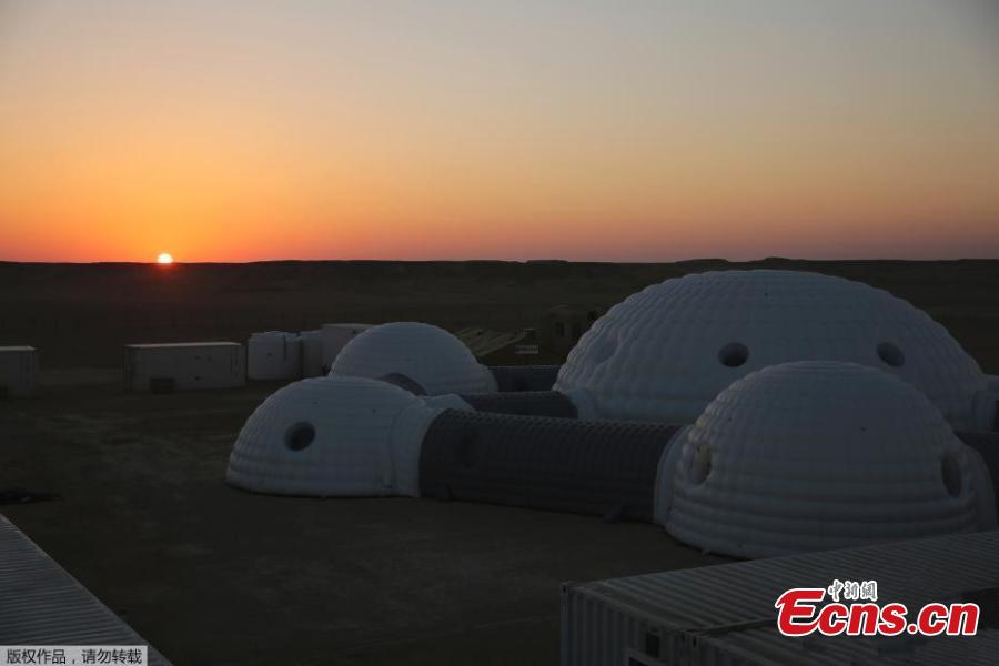 Astronauts are spending a month in isolation on a simulated \'red planet\' in the desolate Dhofar desert in Oman to help prepare humanity for a future mission to Mars. Using a drone, robotic rovers and an inflatable greenhouse, the astronauts will carry out 19 experiments on this baron area, picked for its resemblance to Mars. Seen from space, the Dhofar Desert is a flat, brown expanse and few animals or plants survive its temperatures that can top 125 degrees Fahrenheit, or 51 degrees Celsius.
On the eastern edge of a seemingly endless dune is the Oman Mars Base is a giant 2.4-ton inflated habitat surrounded by shipping containers turned into labs and crew quarters. More than 200 scientists from 25 nations have chosen it as their location to field-test technology for a manned mission to the red planet which Nasa hopes to achieve by the 2030s. (Photo/Agencies)