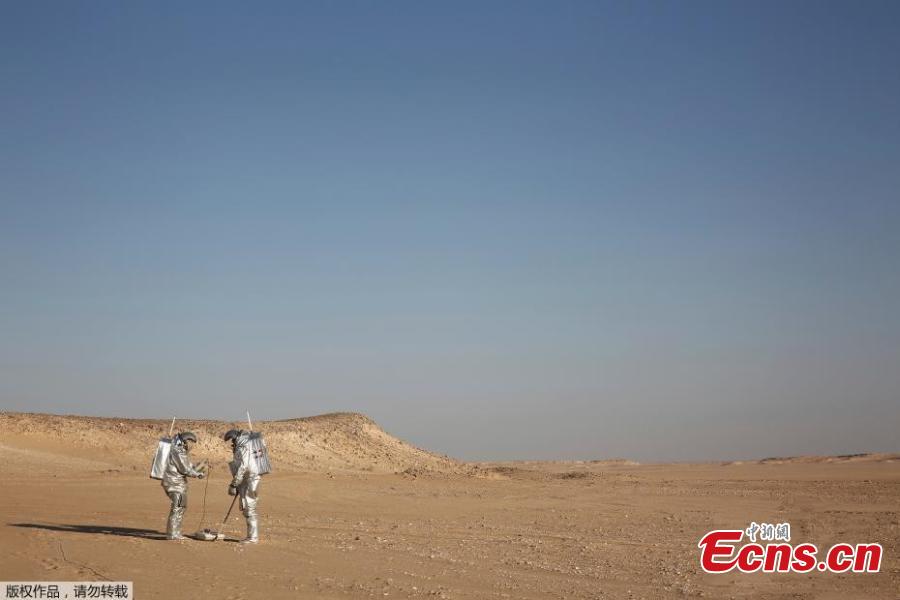 Astronauts are spending a month in isolation on a simulated \'red planet\' in the desolate Dhofar desert in Oman to help prepare humanity for a future mission to Mars. Using a drone, robotic rovers and an inflatable greenhouse, the astronauts will carry out 19 experiments on this baron area, picked for its resemblance to Mars. Seen from space, the Dhofar Desert is a flat, brown expanse and few animals or plants survive its temperatures that can top 125 degrees Fahrenheit, or 51 degrees Celsius.
On the eastern edge of a seemingly endless dune is the Oman Mars Base is a giant 2.4-ton inflated habitat surrounded by shipping containers turned into labs and crew quarters. More than 200 scientists from 25 nations have chosen it as their location to field-test technology for a manned mission to the red planet which Nasa hopes to achieve by the 2030s. (Photo/Agencies)