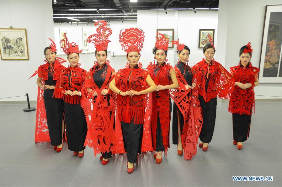 Paper cutting ornaments for qipao designed to greet Chinese lunar New Year(1/4)