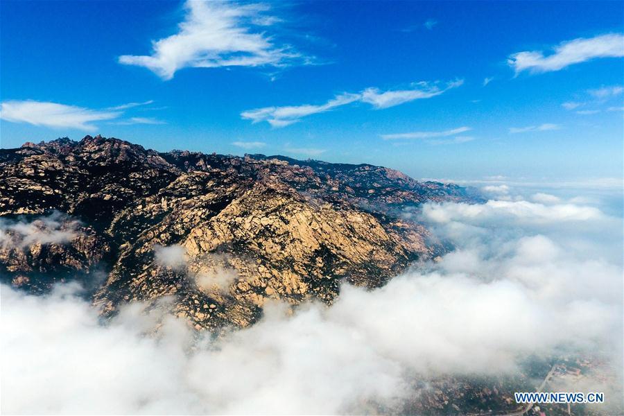 Aerial photo taken on May 19, 2018 shows sea of clouds over the Laoshan Mountain in Qingdao, east China\'s Shandong Province. (Xinhua/Guo Xulei)