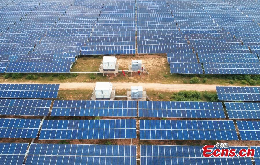 An aerial view of a photovoltaic power plant in Taihe County, East China’s Jiangxi Province, May 23, 2018. The 30MW project, with an investment of 240 million yuan ($37.6 million), was part of efforts to help eradicate poverty in the county. (Photo: China News Service/Deng Heping)