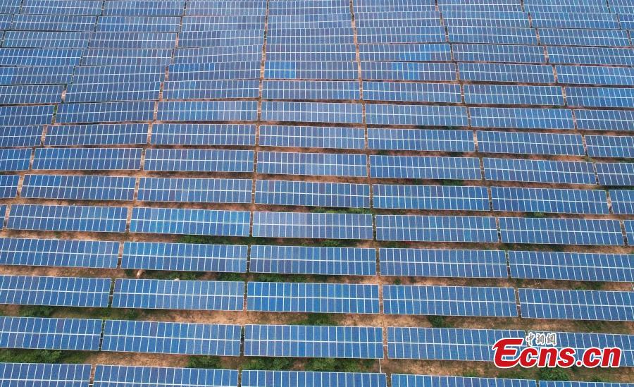 An aerial view of a photovoltaic power plant in Taihe County, East China’s Jiangxi Province, May 23, 2018. The 30MW project, with an investment of 240 million yuan ($37.6 million), was part of efforts to help eradicate poverty in the county. (Photo: China News Service/Deng Heping)