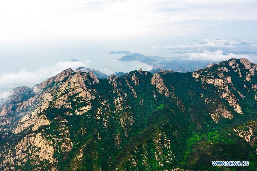 Aerial photo taken on May 21, 2018 shows the Laoshan Mountain in Qingdao, east China\'s Shandong Province. (Xinhua/Guo Xulei)