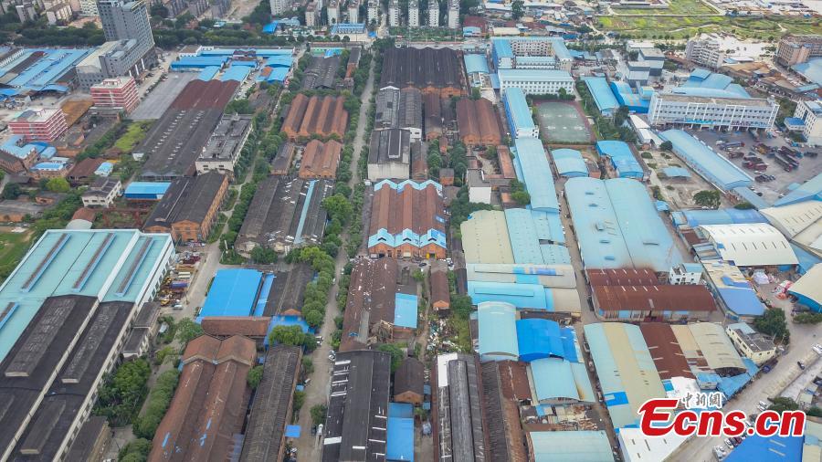 A view of a former walking tractor factory in Nanning City, South China’s Guangxi Zhuang Autonomous Region. Xu Xiaomao, Ouyang Dinghua and Wei Ning rented the space in April 2015 and renovated it for their startup in video and music production. The closed tractor factory was built in 1956 of the former Soviet style. (Photo: China News Service/Liu Yujun)