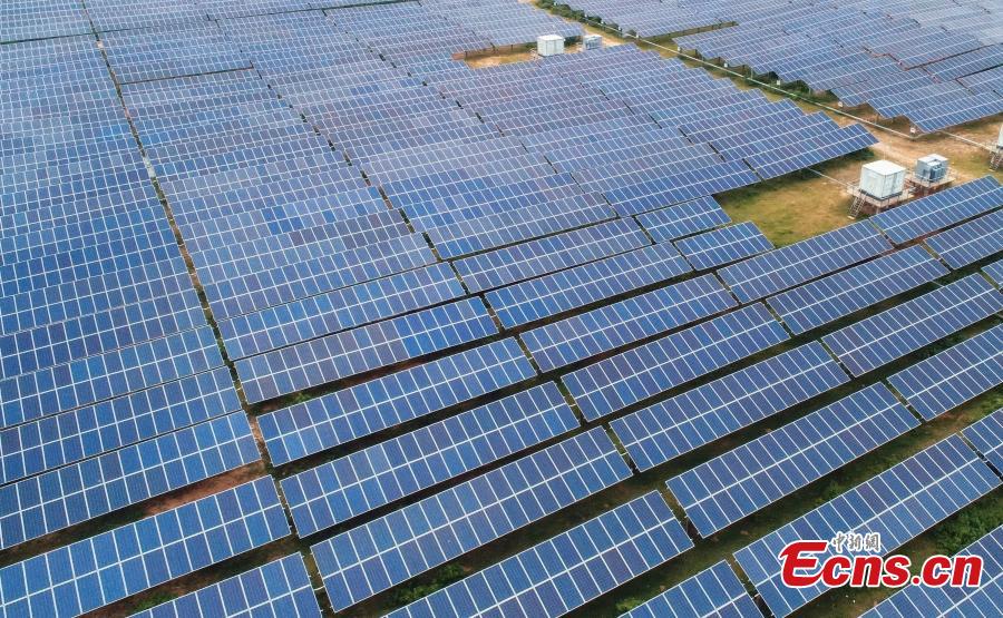 An aerial view of a photovoltaic power plant in Taihe County, East China’s Jiangxi Province, May 23, 2018. The 30MW project, with an investment of 240 million yuan ($37.6 million), was part of efforts to help eradicate poverty in the county. (Photo: China News Service/Deng Heping)