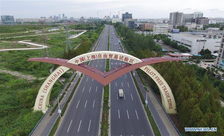 Aerial photo taken on Sept. 21, 2016 shows a view of the China (Shanghai) Pilot Free Trade Zone in Shanghai, east China. This year marks the 40th anniversary of China\'s starting to implement reform and opening up policy. (Xinhua/Pei Xin)