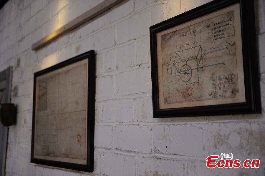Three young people have transformed an abandoned room of a walking tractor factory into a modern office space for their cultural creations in Nanning City, South China’s Guangxi Zhuang Autonomous Region. Xu Xiaomao, Ouyang Dinghua and Wei Ning rented the space in April 2015 and renovated it for their startup in video and music production. The closed tractor factory was built in 1956 of the former Soviet style. (Photo: China News Service/Liu Yujun)