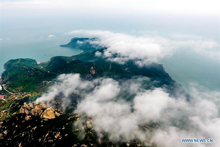 Aerial photo taken on May 21, 2018 shows sea of clouds over the Laoshan Mountain in Qingdao, east China\'s Shandong Province. (Xinhua/Guo Xulei)