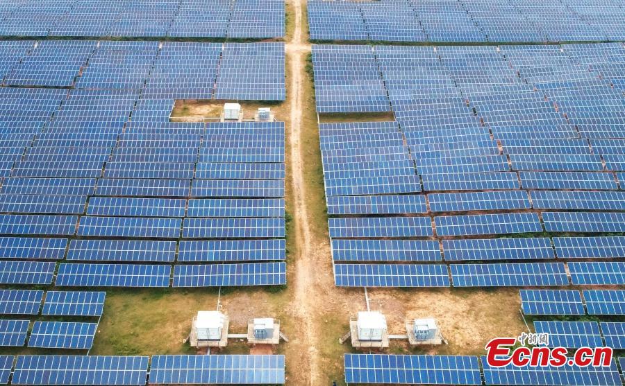 An aerial view of a photovoltaic power plant in Taihe County, East China’s Jiangxi Province, May 23, 2018. The 30MW project, with an investment of 240 million yuan ($37.6 million), was part of efforts to help eradicate poverty in the county. (Photo: China News Service/Deng Heping)