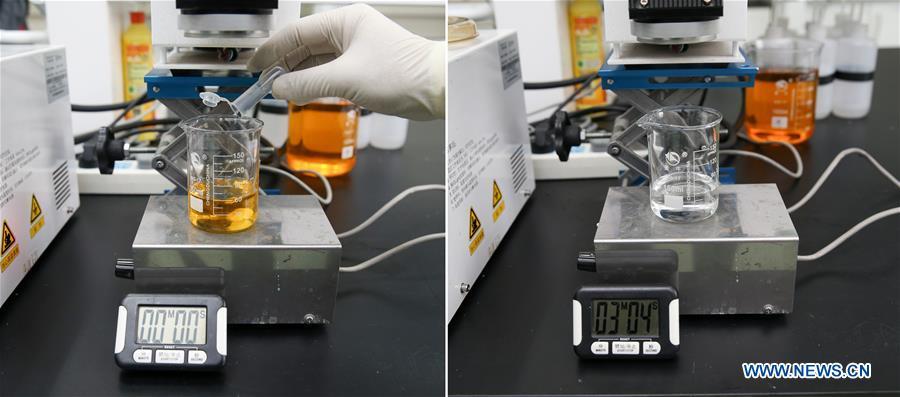 Combined photo taken on April 24, 2018 shows oil-contaminated water turning clear under the cleaning effect of a composite material within three minutes and four seconds at the Shanghai Institute of Ceramics of Chinese Academy of Sciences in east China\'s Shanghai. A new composite material developed by a group of Chinese researchers has proved highly effective in cleaning water contaminated by organics. (Xinhua/Ding Ting)