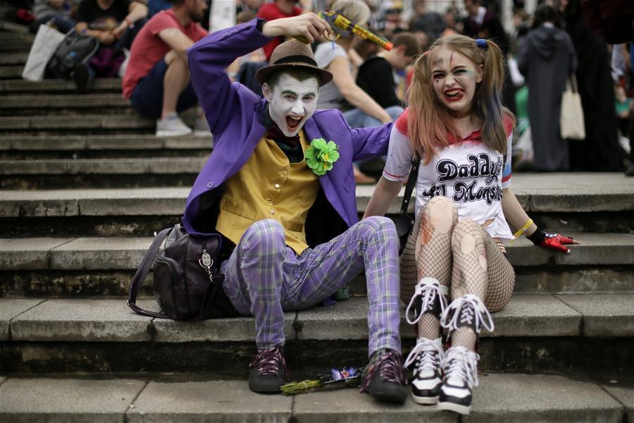 People dressed in costumes are seen at the MCM Comic Con at the ExCel center in London, Britain, on May 27, 2018. The MCM Comic Con was held in London from May 25 to May 27, attacting lots of comic fans to the popular culture gathering. (Xinhua/Tim Ireland)