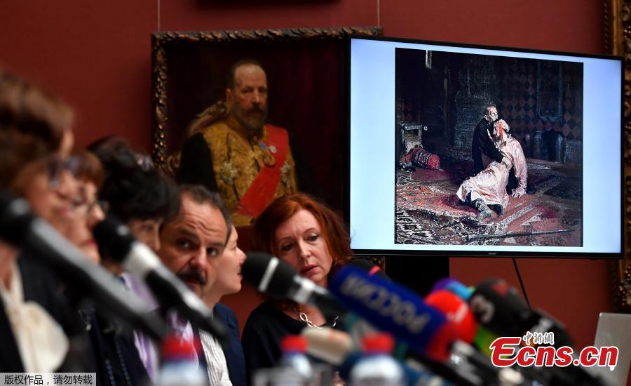 Russian State Tretyakov Gallery officials attend a press conference after Ilya Repin\'s world famous painting of the 16th century Russian Tsar, titled \'Ivan the Terrible and his Son Ivan on November 16, 1581.\' was damaged in Moscow on May 28, 2018. - Russian police on Saturday said they arrested a man for vandalising one of the best known works of 19th century painter Ilya Repin, depicting Ivan the Terrible killing his son, at a gallery in Moscow. (Photo/Agencies)