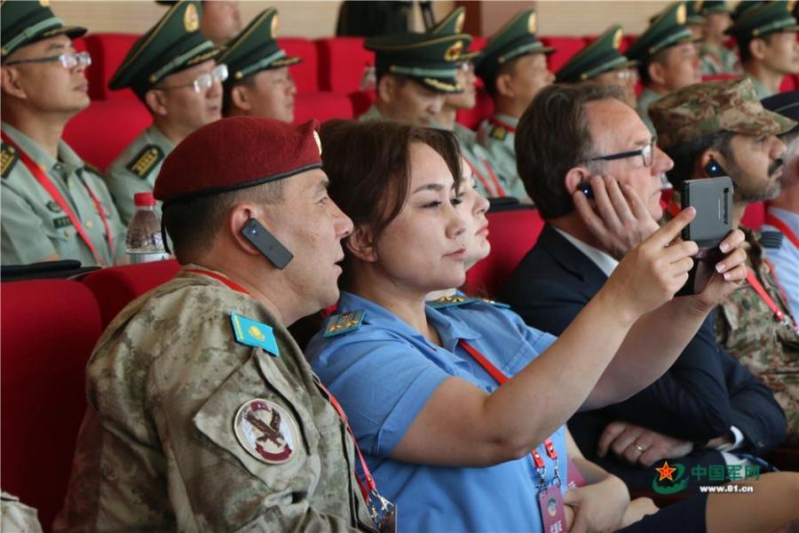 Photo taken on May 28, 2018 at the Great Wall 2018 Anti-terror International Forum shows Special Police of China members demonstrating anti-terror training programs at the Special Police Academy of the Chinese People\'s Armed Police Force in Beijing. The training included shooting and forced airplane cabin entry. (Photo/81.cn)