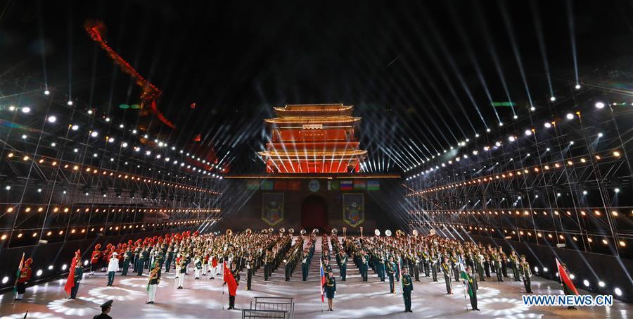 Eight military bands from different countries perform at the opening ceremony of a military band festival of the Shanghai Cooperation Organization (SCO) at a square of the Juyongguan Pass of the Great Wall in Beijing, capital of China, April 24, 2018. The 18th Shanghai Cooperation Organization (SCO) Summit is scheduled for June 9 to 10 in Qingdao, a coastal city in east China\'s Shandong Province. Since China took over the rotating presidency of the SCO last June, more than 160 activities including a series of important institutional meetings and multilateral events have been held so far. (Xinhua/Ju Zhenhua)