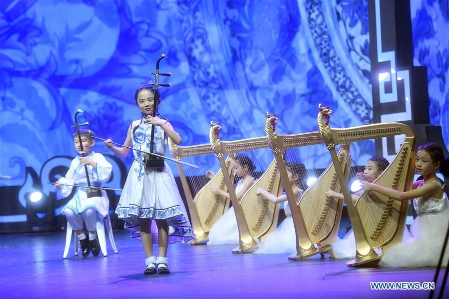 Children from China perform during a cultural exchange activity among youth from Shanghai Cooperation Organization (SCO) member countries in Beijing, capital of China, Aug. 22, 2017. The 18th Shanghai Cooperation Organization (SCO) Summit is scheduled for June 9 to 10 in Qingdao, a coastal city in east China\'s Shandong Province. Since China took over the rotating presidency of the SCO last June, more than 160 activities including a series of important institutional meetings and multilateral events have been held so far. (Xinhua/Jin Liangkuai)