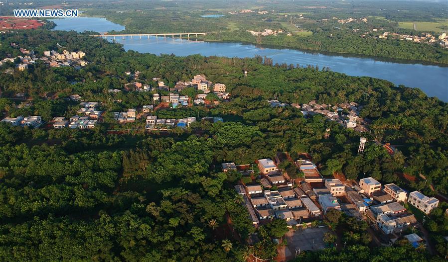 Aerial photo taken on May 30, 2018 shows the Yunlong Township in Haikou City, south China\'s Hainan Province. Efforts made by Haikou City to restore ecosystem have improved the water quality of wetlands, which are expected to play a better role in flood prevention, climate regulation and preservation of the local biodiversity. (Xinhua/Zhao Yingquan)