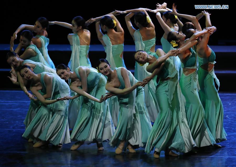 Chinese dancers perform during a folk dance show of the Shanghai Cooperation Organization (SCO) art festival held in Beijing, capital of China, June 1, 2018. (Xinhua/Shen Bohan)
