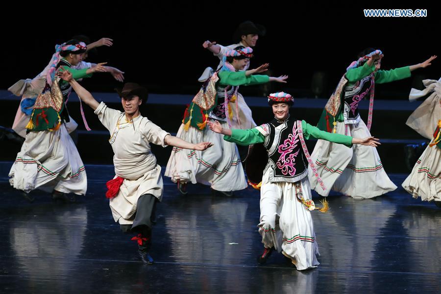 Chinese dancers perform during a folk dance show of the Shanghai Cooperation Organization (SCO) art festival held in Beijing, capital of China, June 1, 2018.