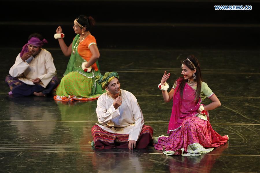 Pakistani dancers perform during a folk dance show of the Shanghai Cooperation Organization (SCO) art festival held in Beijing, capital of China, June 1, 2018. (Xinhua/Shen Bohan)