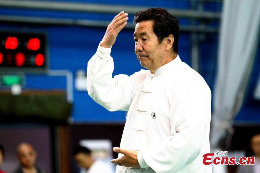 A participant performs Tai Chi in a martial arts contest during the 17th Qinghai Province Games in Xining City, Northwest China’s Qinghai Province, June 3, 2018. (Photo: China News Service/Chen Tianfu)
