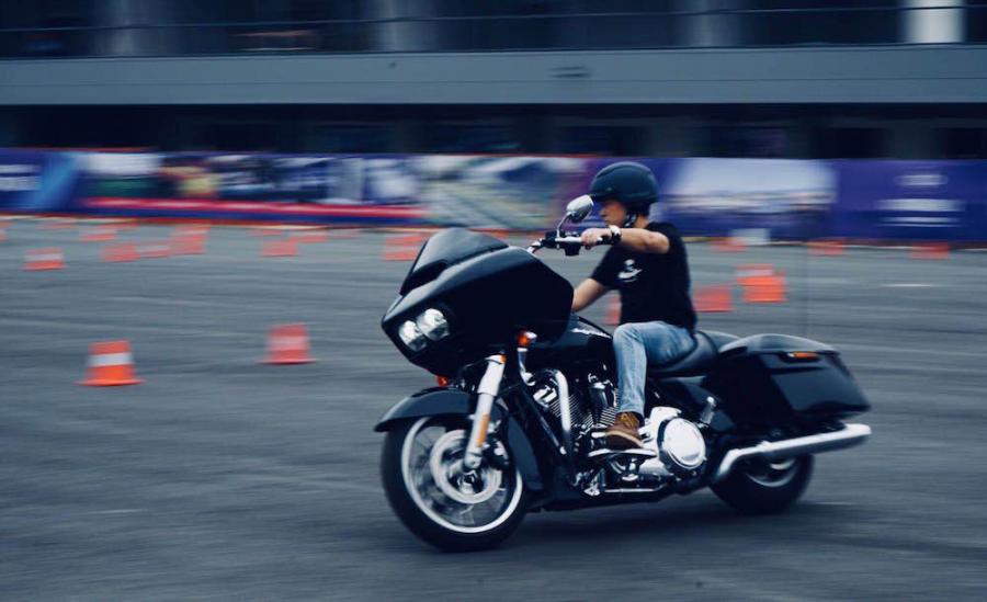 Riders on Harley-Davidson motorcycles parade through an auto park in Chengdu City, Southwest China’s Sichuan Province, June 3, 2018. More than 100 participants rode Harley-Davidson motorcycles for the second stop of the 2018 Freedom Tour. (Photo: China News Service/Zhong Xin)