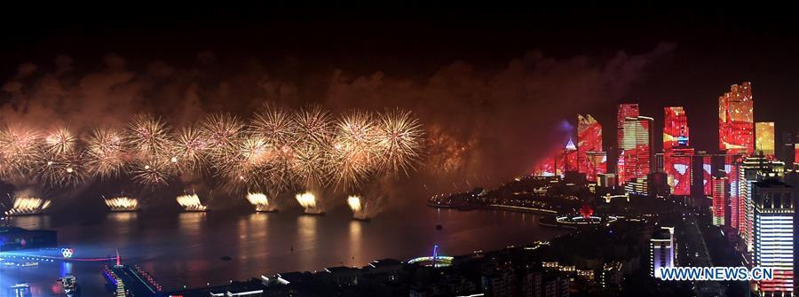 A lights and fireworks show takes place in Qingdao, the host city of the 18th Shanghai Cooperation Organization (SCO) summit, in east China\'s Shandong Province, June 9, 2018. (Xinhua/Li Ziheng)