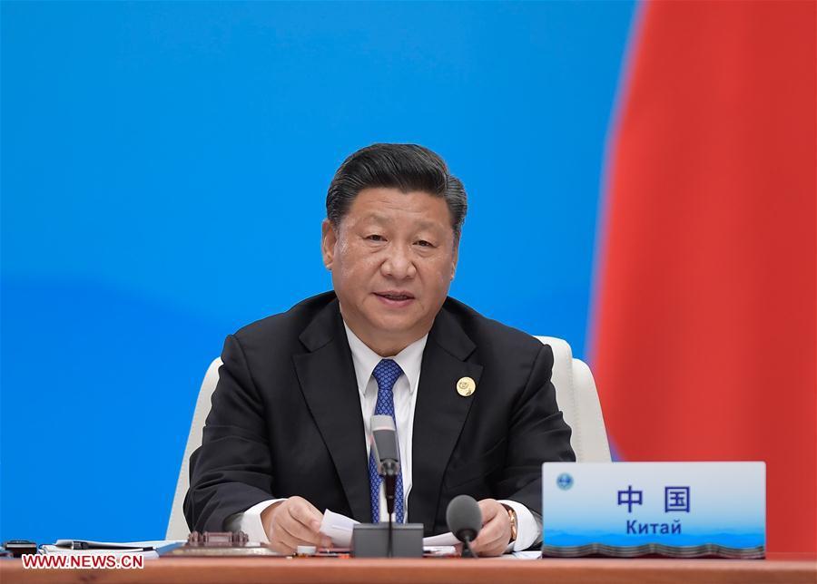 Chinese President Xi Jinping chairs the 18th Meeting of the Council of Heads of Member States of the Shanghai Cooperation Organization (SCO) in Qingdao, east China\'s Shandong Province, June 10, 2018. Xi delivered a speech during the meeting. (Xinhua/Li Xueren)