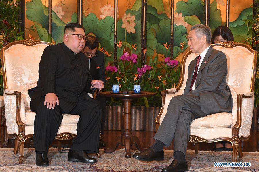 Singaporean Prime Minister Lee Hsien Loong (R) meets with Kim Jong Un, chairman of the Workers\' Party of Korea (WPK) and chairman of the State Affairs Commission of the Democratic People\'s Republic of Korea (DPRK), in Singapore, on June 10, 2018. (Xinhua/Then Chih Wey)