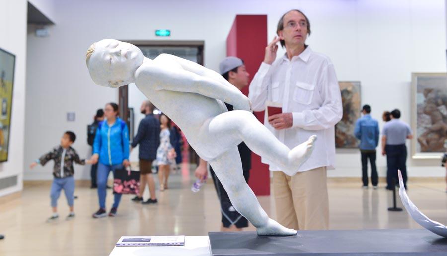 A sculpture on display at the 6th National Youth Art Exhibition in the National Art Museum in Beijing, June 10, 2018. More than 380 art pieces created by young Chinese artists are showcased to reflect the new development and artistic characteristics of contemporary art among young people. Exhibits include Chinese painting, oil painting, printmaking, sculptures, watercolors and illustrations. (Photo/Xinhua)