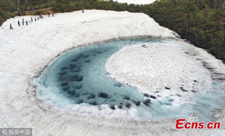 In this aerial image, Kagaminuma Pond is seen on June 5, 2018 in Iwate, Japan. Snow melting water creates an eye-shaped pond on the Hachimantai mountain. (Photo/VCG)