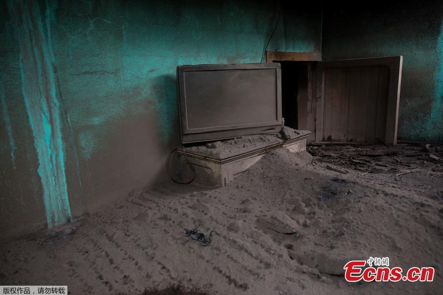 A view of a house affected by the eruption of the Fuego volcano at San Miguel Los Lotes in Escuintla, Guatemala. Everything in the previously lush, bright green landscape is coated in thick layers of sepia-colored volcanic ash, giving the place the eerie feeling of a ghost ship. (Photo/Agencies)