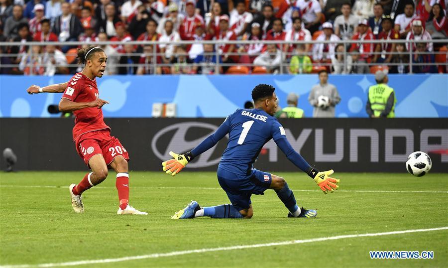 Yussuf Yurary Poulsen (L) of Denmark scores during a group C match between Peru and Denmark at the 2018 FIFA World Cup in Saransk, Russia, June 16, 2018. (Xinhua/He Canling)