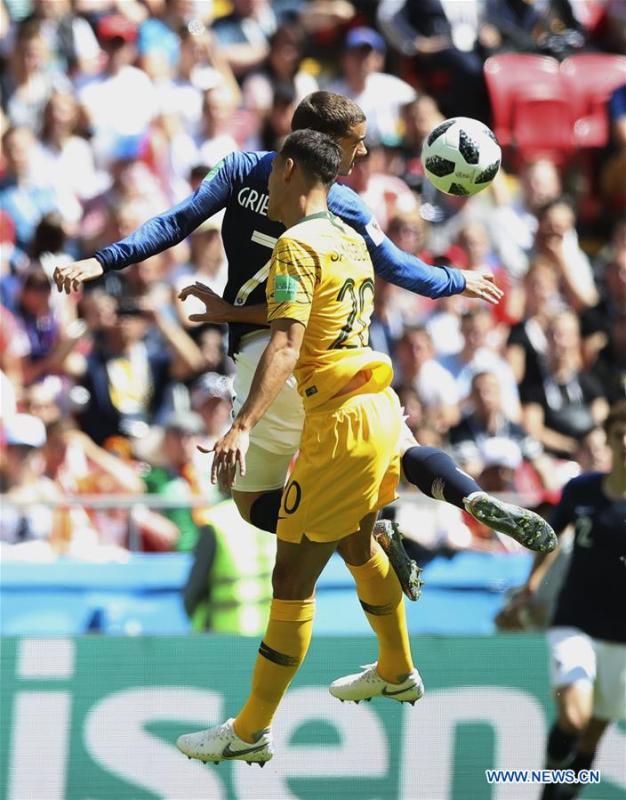 Antoine Griezmann (top) of France vies with Trent Sainsbury of Australia during a group C match between France and Australia at the 2018 FIFA World Cup in Kazan, Russia, June 16, 2018. (Xinhua/Wu Zhuang)