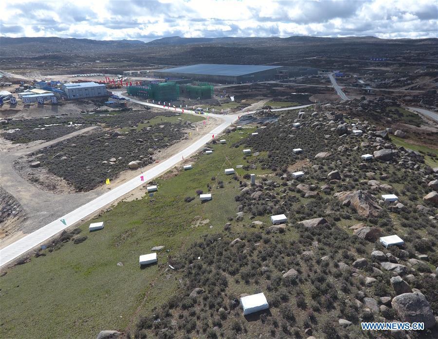 Aerial photo taken on June 19, 2018 shows the Electromagnetic Particle Detectors in the Large High Altitude Air Shower Observatory (LHAASO) which is under construction in Daocheng County, southwest China\'s Sichuan Province. An observatory for detecting cosmic rays is being built in Sichuan Province. The project, known as the LHAASO, is located in mountains of the eastern part of Qinghai-Tibet Plateau at an average altitude of 4,410 meters. (Xinhua/Liu Kun)