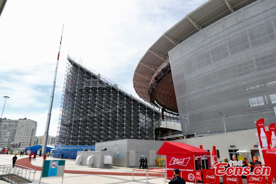 The enormous temporary stand at the World Cup stadium in Ekaterinburg, Russia. FIFA regulations state that each World Cup venue must have a minimum capacity of 35,000. The stadium only held 23,000 spectators and renovation was impossible with time quickly running out, so the enormous temporary stands were erected at either end of the pitch to reach the requirement. (Photo: China News Service/Fu Tian)