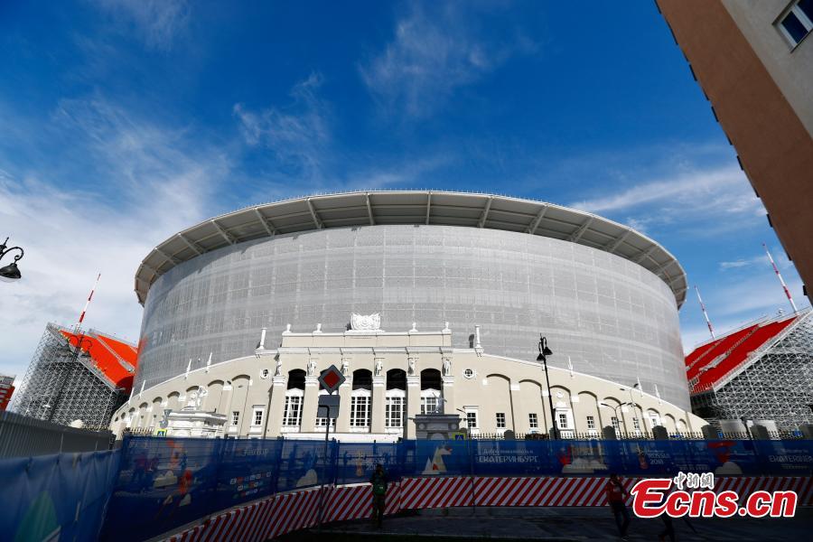 The enormous temporary stand at the World Cup stadium in Ekaterinburg, Russia. FIFA regulations state that each World Cup venue must have a minimum capacity of 35,000. The stadium only held 23,000 spectators and renovation was impossible with time quickly running out, so the enormous temporary stands were erected at either end of the pitch to reach the requirement. (Photo: China News Service/Fu Tian)