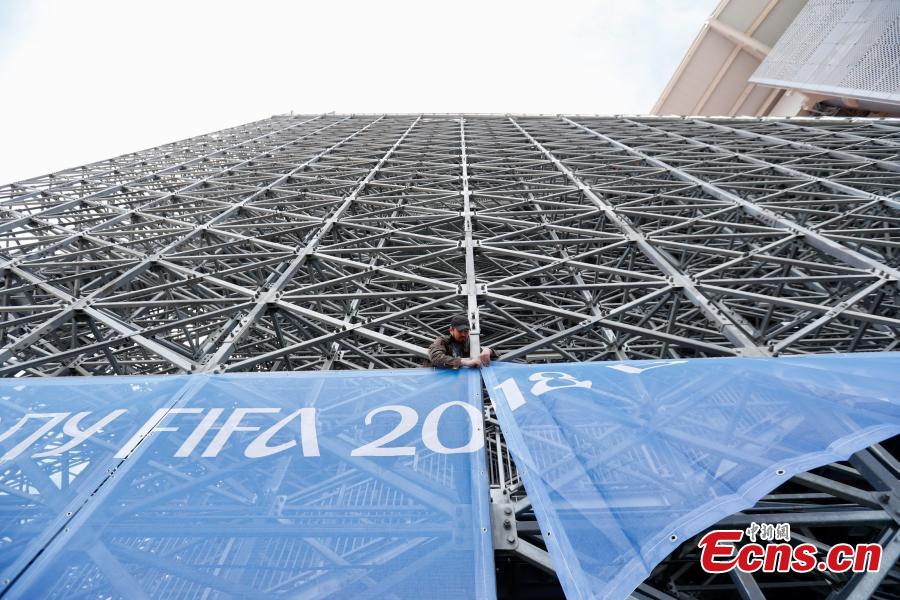 The enormous temporary stand at the World Cup stadium in Ekaterinburg, Russia. FIFA regulations state that each World Cup venue must have a minimum capacity of 35,000. The stadium only held 23,000 spectators and renovation was impossible with time quickly running out, so the enormous temporary stands were erected at either end of the pitch to reach the requirement. (Photo: China News Service/Fu Tian)