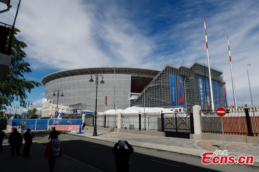 The enormous temporary stand at the World Cup stadium in Ekaterinburg, Russia. FIFA regulations state that each World Cup venue must have a minimum capacity of 35,000. The stadium only held 23,000 spectators and renovation was impossible with time quickly running out, so the enormous temporary stands were erected at either end of the pitch to reach the requirement. (Photo: China News Service/Fu Tian)