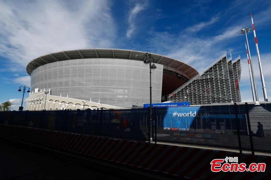 The enormous temporary stand at the World Cup stadium in Ekaterinburg, Russia. FIFA regulations state that each World Cup venue must have a minimum capacity of 35,000. The stadium only held 23,000 spectators and renovation was impossible with time quickly running out, so the enormous temporary stands were erected at either end of the pitch to reach the requirement. (Photo: China News Service/Fu Tian)