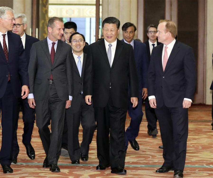 Chinese President Xi Jinping (2nd R, front) meets with executives of some famous multinational enterprises, who are in Beijing to attend a special session of round-table summit of Global CEO Council at the Diaoyutai State Guesthouse in Beijing, capital of China, June 21, 2018. Xi attended a symposium with the executives here on Thursday. (Xinhua/Ding Lin)
