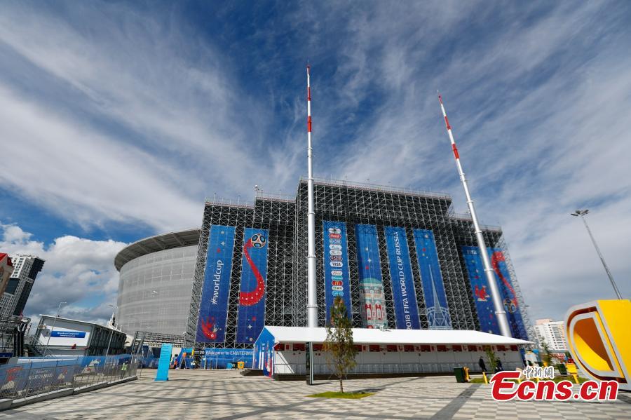 The enormous temporary stand at the World Cup stadium in Ekaterinburg, Russia. FIFA regulations state that each World Cup venue must have a minimum capacity of 35,000. The stadium only held 23,000 spectators and renovation was impossible with time quickly running out, so the enormous temporary stands were erected at either end of the pitch to reach the requirement. (Photo: China News Service/Fu Tian)