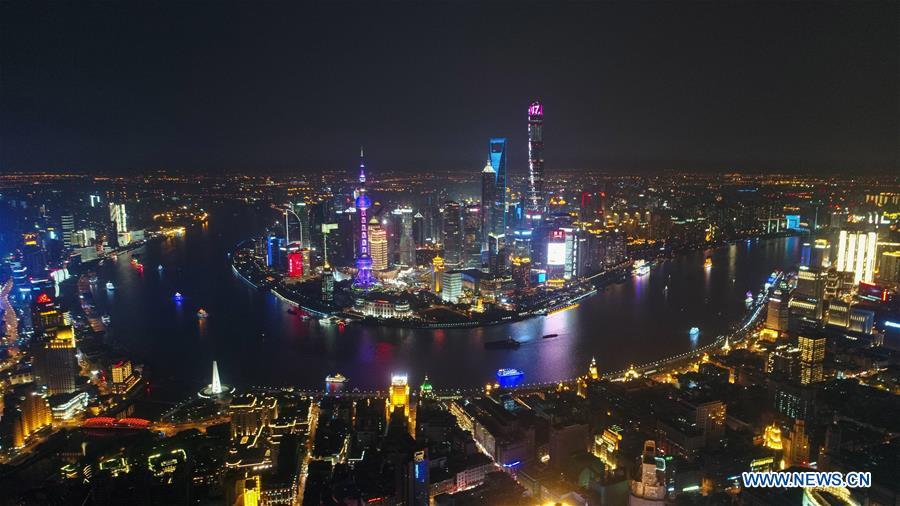 Aerial photo taken on April 15, 2017 shows night view of the Huangpu River in Shanghai, east China. China announced the opening-up and development of Pudong in 1990. Pudong is expecting to take the opportunity of celebrating the 40th anniversary of China\'s reform and opening-up to continue to spearhead the country\'s reform and development. (Xinhua/Ding Ting)