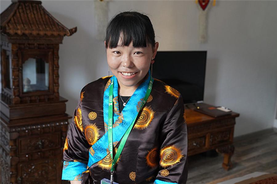 A homestay operator at Boma village in Lhasa, Tibet autonomous region, June 22, 2018. (Photo/Xinhua)
Lhasa is also a tourist city with more than 16 million tourists visiting every year and generating 22.7 billion yuan in income last year.
Some Tibetan people are taking advantage to start homestay business.
Now, people living in Boma, a relocation village that aims lift people from poverty, are building projects for tourists in Tibetan style.