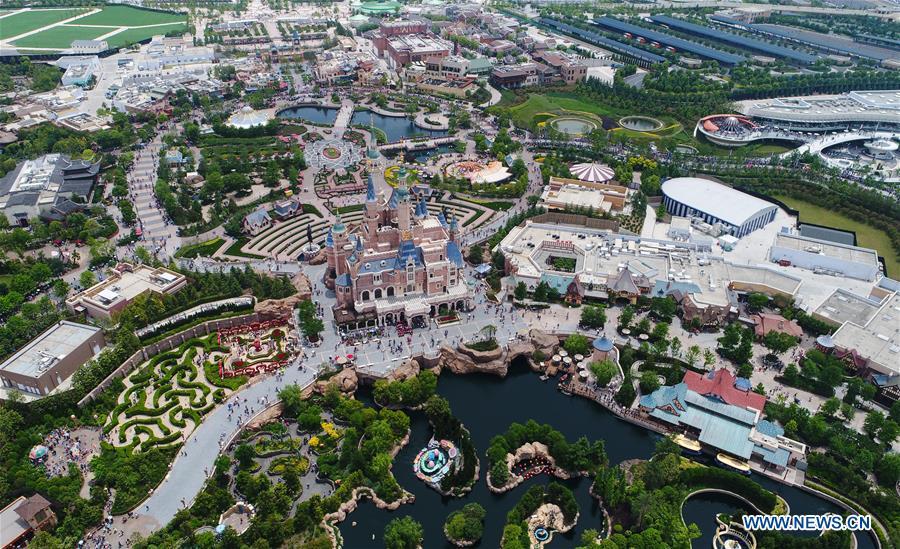 Aerial photo taken on May 19, 2017 shows a scene of Shanghai Disney Resort in Pudong of Shanghai, east China. China announced the opening-up and development of Pudong in 1990. Pudong is expecting to take the opportunity of celebrating the 40th anniversary of China\'s reform and opening-up to continue to spearhead the country\'s reform and development. (Xinhua/Ding Ting)