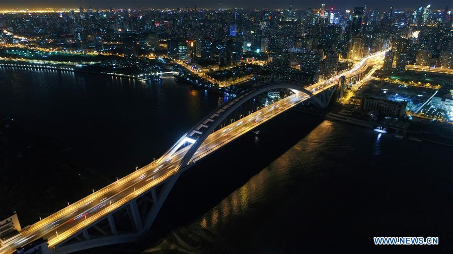 Aerial photo taken on April 13, 2017 shows the Lupu Bridge in Shanghai, east China. China announced the opening-up and development of Pudong in 1990. Pudong is expecting to take the opportunity of celebrating the 40th anniversary of China\'s reform and opening-up to continue to spearhead the country\'s reform and development. (Xinhua/Ding Ting)