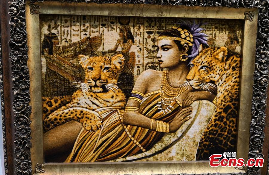 A colorful tapestry is on show in Linxia Hui Autonomous Prefecture, Northwest China\'s Gansu Province. Linxia has a history of nearly 1,000 years making tapestries depicting a broad range of topics, from galloping horses to beautiful landscapes. Usually a tapestry involves dozens of procedures and prices can be as high as 100,000 yuan ($15,000). They also sell well in other counties including the United States, Japan and Germany. (Photo: China News Service/Liu Yutao)