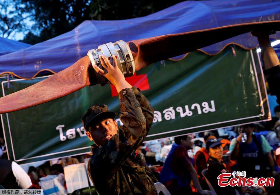 Rescue workers work near the Tham Luang caves during a search for members of an under-16 soccer team and their coach, in the northern province of Chiang Rai, Thailand, June 27, 2018. Twelve boys, aged 11 to 16, and their 25-year-old coach, were trapped on Saturday after heavy rain flooded the cave complex in a forest park in the northern province of Chiang Rai. (Photo/Agencies)
