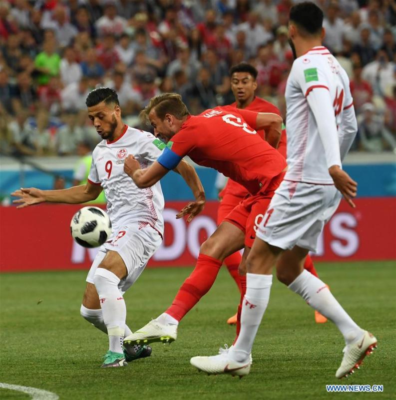 Harry Kane (C) of England shoots to score during a group G match between Tunisia and England at the 2018 FIFA World Cup in Volgograd, Russia, June 18, 2018. (Xinhua/Chen Cheng)
Best marksman
Harry Kane is the World Cup\'s top scorer so far with five goals despite being rested for England\'s last group match against Belgium on Thursday. The Tottenham striker is aiming to become his country\'s first Golden Boot winner since Gary Lineker in 1986.